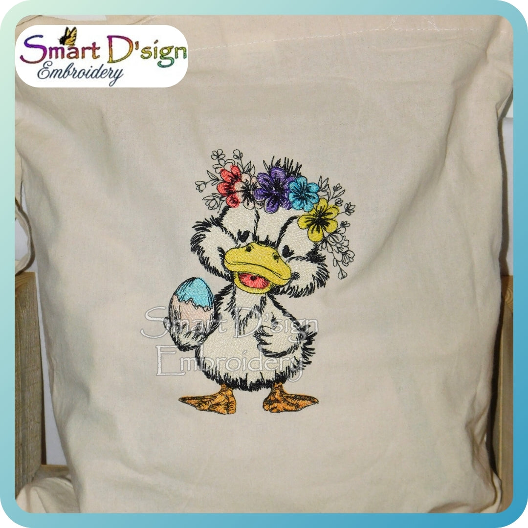 Embroidered design of a duck with flowers on a beige fabric, branded with Smart D'Sign Embroidery.